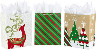 Gift bags are very handy and come in many sizes. Amazon Com Hallmark 13 Large Christmas Gift Bag Assortment With Tissue Paper Red And Green Stripes Tree Reindeer Pack Of 3 Kitchen Dining