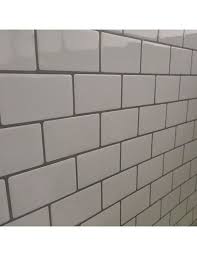 white subway tile with gray grout