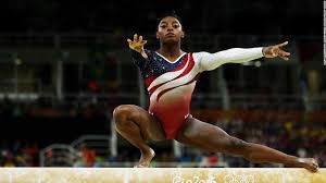 biles out of vault and uneven bars