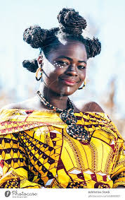 african woman in bright traditional
