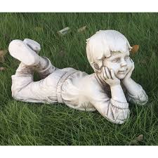 Boy Lying Down Statue