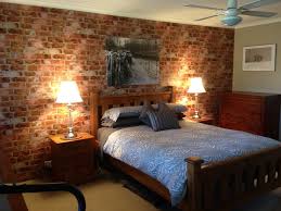 50 brick wallpaper in bedroom on