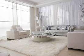 A lounge room of greys and creams, black and white prints all come together to make this a relaxing and peaceful space. 12 Lovely White Living Room Furniture Ideas