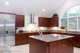 This kitchen cabinet has some warm tones and rich look. Boston Metrowest Modern Contemporary Cherry Kitchen Divine Design Center