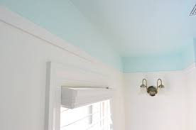 color and trim to a bathroom ceiling