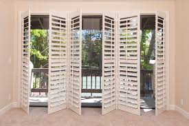 Alutech's accordion hurricane shutters are designed to cover windows, sliding glass doors or enclose total balconies. 5 Best Window Treatments For Sliding Glass Doors