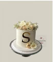 fondant wedding cake with fresh flowers