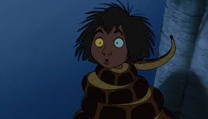 Kaa's long body was slowly slithering down a tree. A Delisssciousss Mancub In The First Encounter Kaa Tells Mowgli To Go To