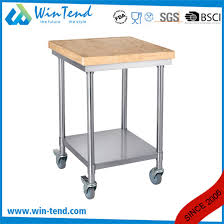 The tabletop is 49 inches long and 24 inches wide, with the tabletop standing 39 inches above stainless steel top work surface. China Commercial Restaurant Kitchen Stainless Steel Work Table With Wooden Top Shelf And Wheels China Worktable Restaurant Worktable