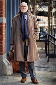 You might want to wear the overcoat and try on several scarfs. Pin On Camel Coat