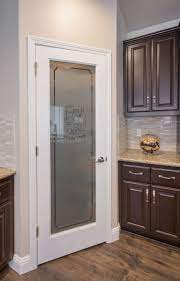 frosted glass pantry door in kitchen