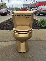 The toilet is supposed to represent america's wealth and excess, and seems like it would line up nicely with trump's taste. Here S What Those Golden Take A Trump Toilets Mean