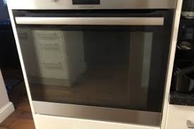 how to clean oven glass with vinegar