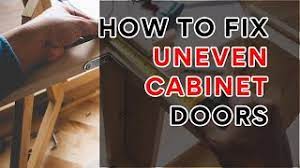 how to fix uneven cabinet doors