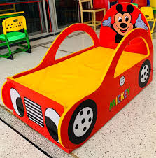 red yellow wooden kids car bed