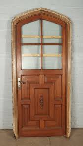 Arched Mahogany Door With Glass Panes