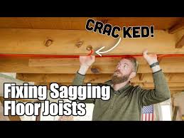 how to fix sagging floor joists you