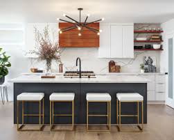 This gorgeous contemporary kitchen by lucy interior design features dark wood cabinetry that the design team at idea space added contemporary flair to this bright cooking space by installing. 20 Contemporary Kitchens