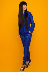 If u feel you look good with long hair then long hair suits you else not. Girl With Black Long Hair In A Blue Suit Posing Stock Photo Image Of Backgrounds Standing 104303872
