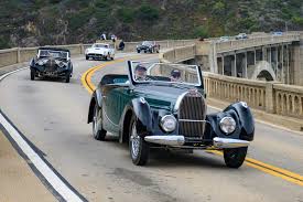 Pebble Beach Concours d'Elegance - The 1938 Bugatti Type 57C Gangloff  Stelvio leads the pack as the Tour d'Elegance presented by ROLEX drives  over the iconic Bixby Bridge in Big Sur. #tourdelegance #
