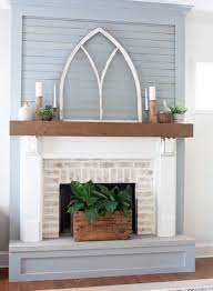 fireplace mantel with window above