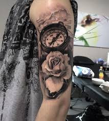 These tattoos with a brass case, a glass, symmetric compass inside with the shadows of the compass and the glass looks really amazing to look. Compass Rose Map Realism Arm Tattoo Best Tattoo Ideas Designs Compass Tattoo Compass Tattoo Design Cool Tattoos