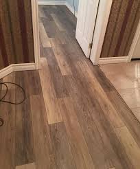 If you cannot get under the doorjambs, you can use an electric handsaw to cut a small groove. Smartcore Ultra Woodford Oak 5 91 In X 48 03 In Waterproof Interlocking Luxury Vinyl Plank Flooring 15 76 Sq Ft Lowes Com Vinyl Plank Flooring Flooring Vinyl Plank