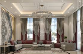 Living room with high ceilings up to second floor and direct exit to the garden featuring elegant decoration, sophisticated chandeliers and bright color details. Living Room Design For A Villa Architect Magazine