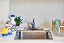 how to clean a snless steel sink