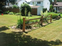 Split rail fence and landscaping | front yard garden. Split Rail Sadler Fence And Staining