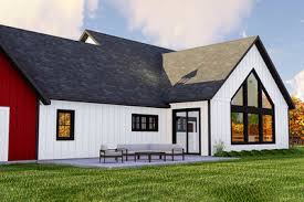 Farmhouse Plan With Barn Style Garage