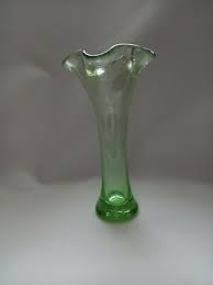 green tinted glass vase with ruffle