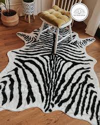 white faux zebra hide area rug