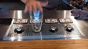 upside down pump pouring glasses