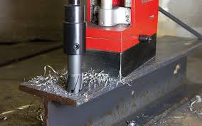 drilling into a steel beam
