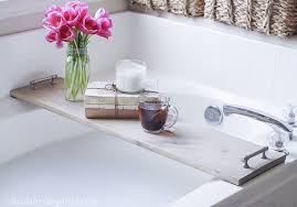 I don't take baths often enough but i think i'm going to change that and start soaking in my big in light of my new resolution {smile}, i made a simple diy bathtub tray to hold a book or magazine, a candle. Easy Diy Bathtub Tray Tutorial Ella Claire Co