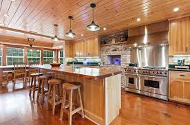 The kitchen design i'm on has cabinets on one wall only, with tile that extends out only 4 feet from the cabinets. What Flooring Goes With Hickory Cabinets Designing Idea