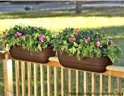 Hang your plants, flower pots, lanterns, feeders and other garden / yard decor with the help of this black iron curved plant bracket. Ideas For Railing Planters Also Cascading Flowers Window Boxes Cascading Planter Deck Railing Planters Railing Planters Balcony Planters