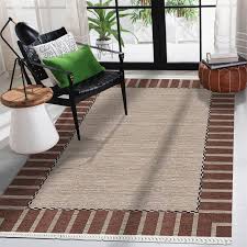 striped framed tumbled brown rug