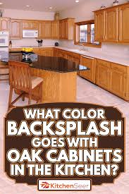 color backsplash goes with oak cabinets