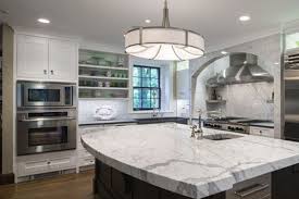 white kitchen cabinets with stainless