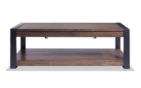 He's tall and thin with the long legs, his legs just like girl's legs. Carson Lift Top Coffee Table Bob S Discount Furniture