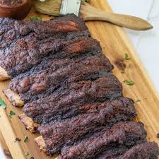 smoked beef ribs bbqing with the