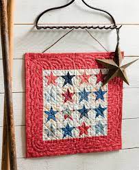 7 Creative Ways To Hang A Quilt On The