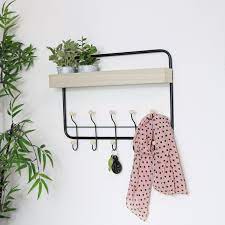 wooden shelf with coat hooks