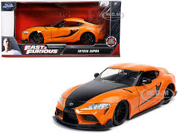 This is because of all the films, it is the fast and furious franchise which has established a cult following among automobile enthusiasts and cinema lovers, alike. Toyota Supra Orange Black Stripes Fast Furious 9 F9 2021 Movie 1 24 Diecast Model