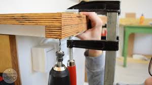 Two people at a table, collaborating and making design changes on . Diy Table Saw Fence Router Table Fence Free Plan 9 Steps With Pictures Instructables