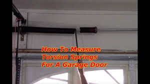 to mere a garage door torsion spring