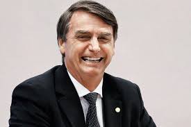 Resultado de imagem para imagens de Bolsonaro rindo