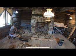 Stone Fireplace In The 1800s Log Cabin